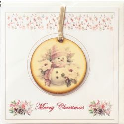 Christmas card featuring a wooden plaque with snowman design